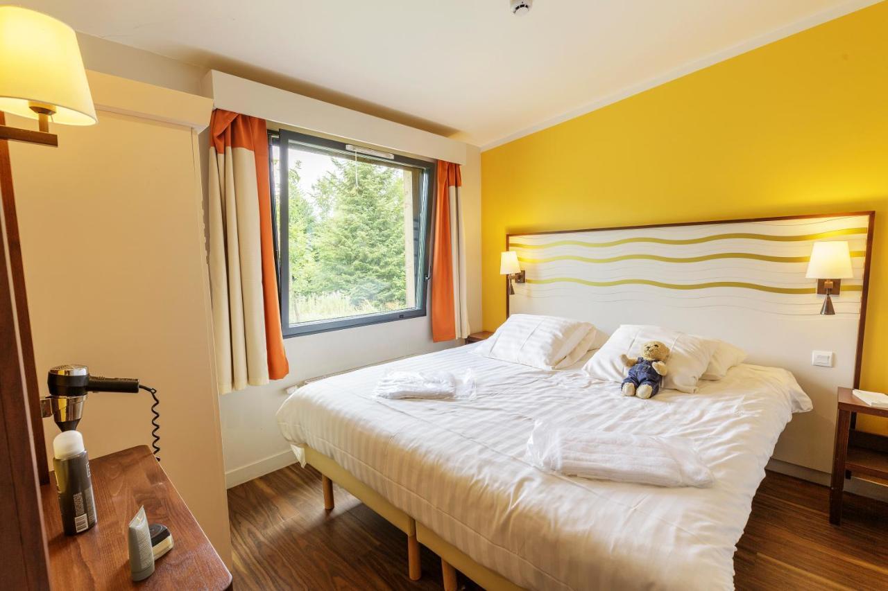 Center Parcs Les Trois Forets Аттиньи Экстерьер фото