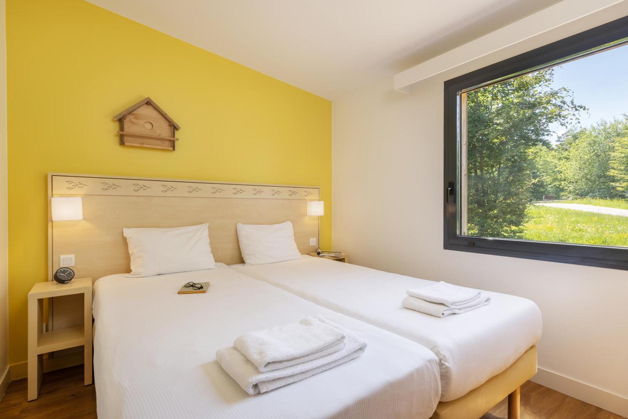 Center Parcs Les Trois Forets Аттиньи Экстерьер фото