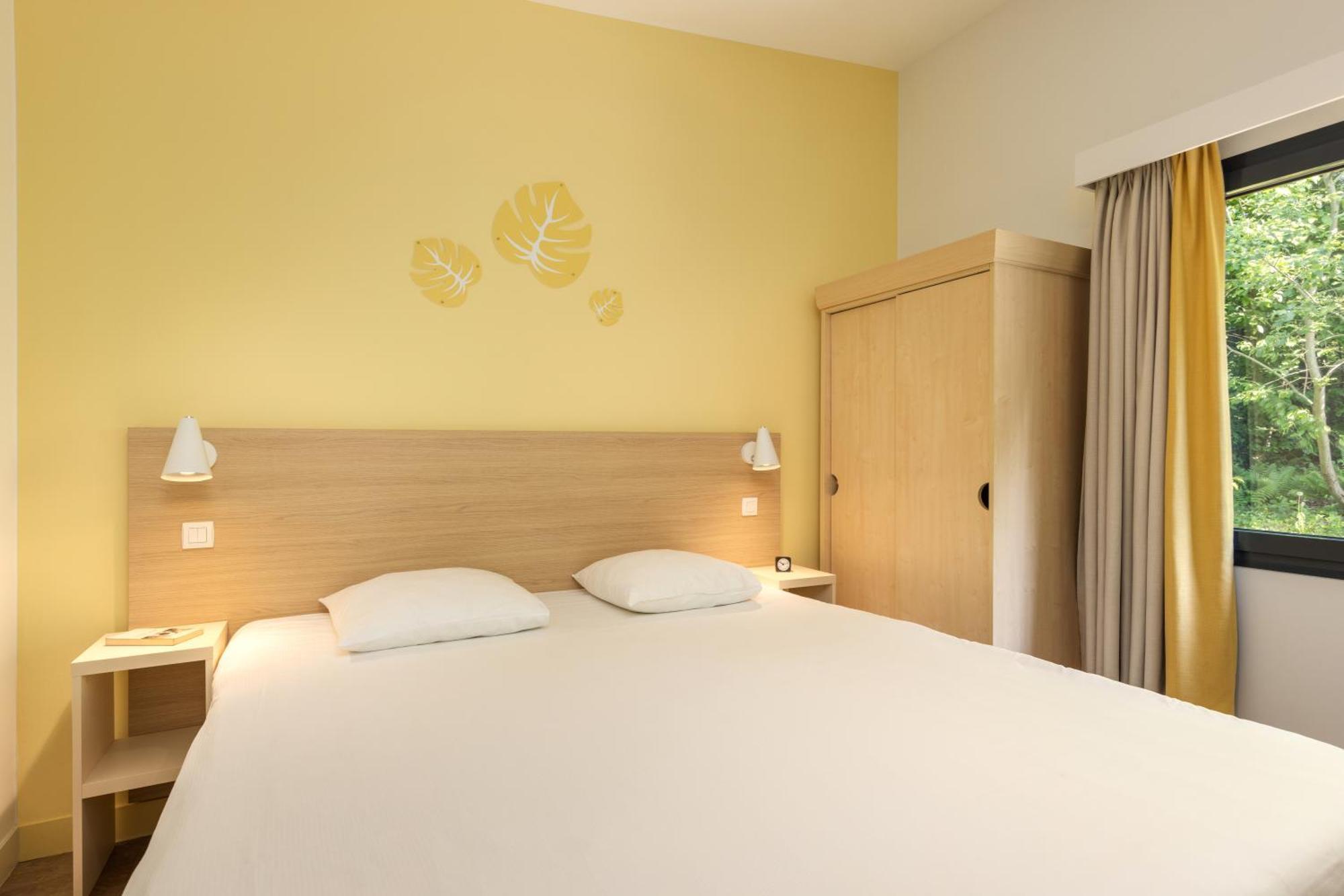 Center Parcs Les Trois Forets Аттиньи Экстерьер фото